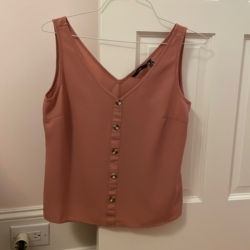 peach color top with fake buttons
